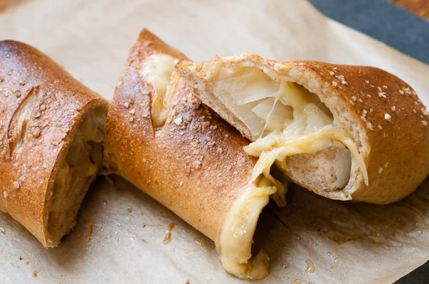 Rye Piroshki with Roasted Onions, Caraway, and Swiss Cheese - Recipe