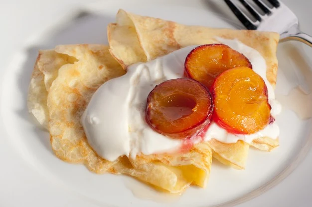 Crepes with Sage-Roasted French Plums, Yogurt and Honey