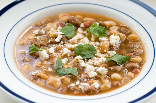 Vegetarian pozole / posole de frijol; hearty Mexican stew with hominy and beans