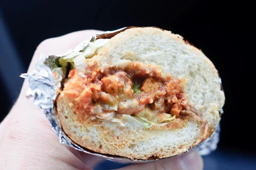 Mexican torta filled with tofu adobado