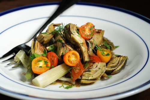 Braised baby artichokes with fennel and cherry tomatoes